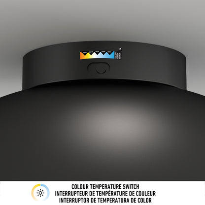 Close-up of the Artika Adara 15 in. LED flush mount light with a color temperature switch, indicator labels, and “Colour Temperature Switch” in English, French, and Spanish shown below the button.