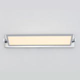 Rectangular modern wall-mounted LED light fixture with a frosted panel in the center, framed by a chrome trim, illuminated against a plain light gray background.