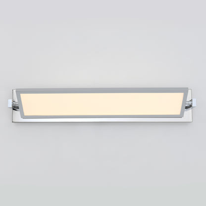 The Artika Reflection Flat Panel LED bathroom vanity light features a rectangular, wall-mounted design with chrome accents and a frosted panel, emitting a soft, even glow against a light gray background.