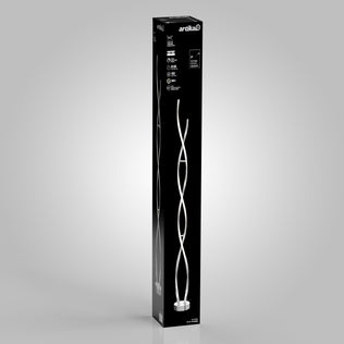 A tall, rectangular black box displays a photo of the Swirl modern LED floor lamp on the front. The Artika brand name appears at the top, with product details and icons in white text on the black background.
