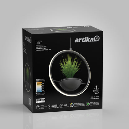A black box displays the Artika Colin LED modern planter pendant light 5 CCT, featuring a circular fixture with a built-in planter and artificial grass. White text on the package highlights product details and features.