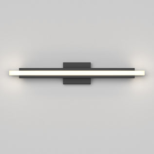 Artika Ophelia modern LED bathroom vanity light with black base, mounted on a light gray wall, perfect for bathrooms.