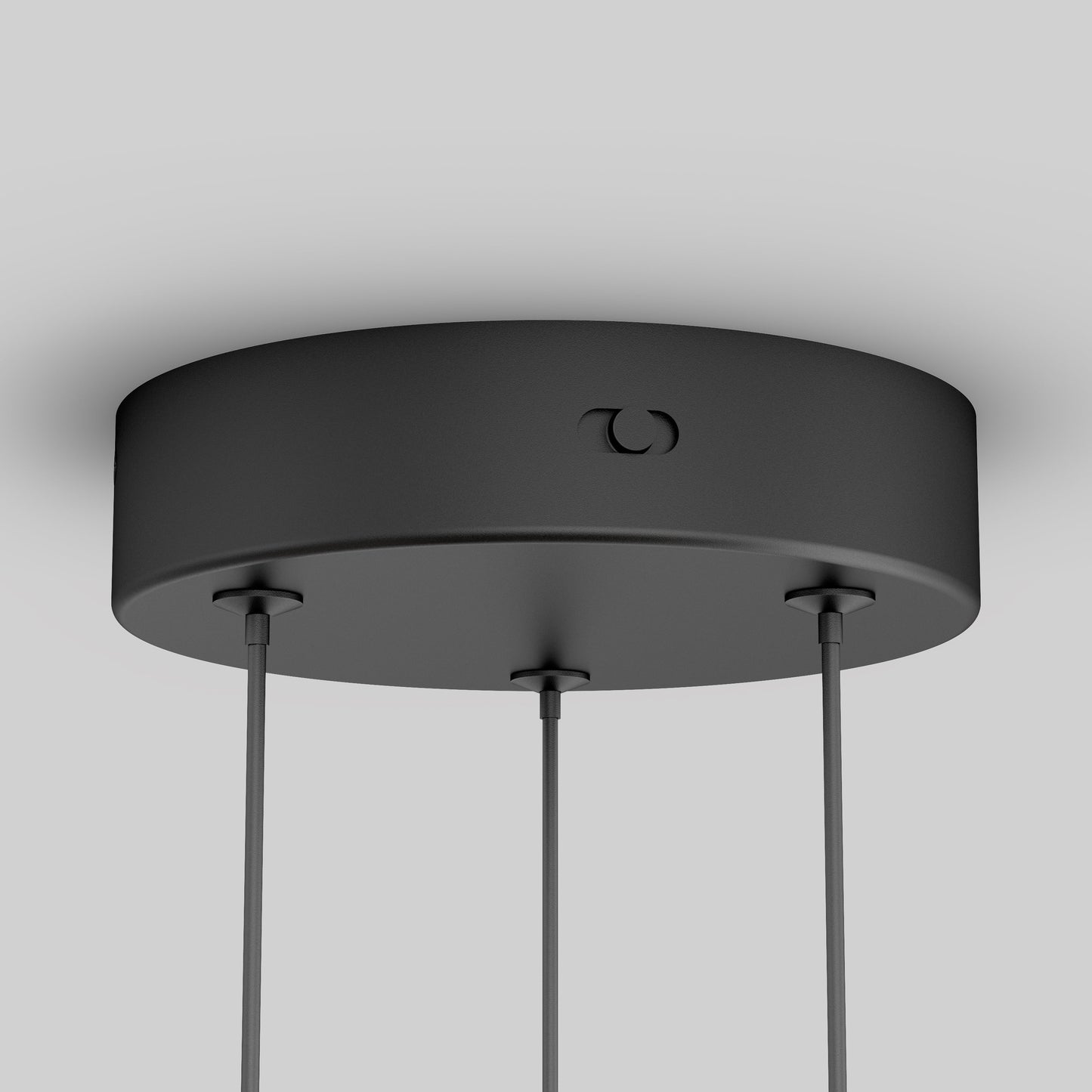 A close-up of the Orly modern LED pendant light 5 CCT by Artika-CAN-dev shows its round black ceiling mount with three hanging cables, set against a plain light gray background.