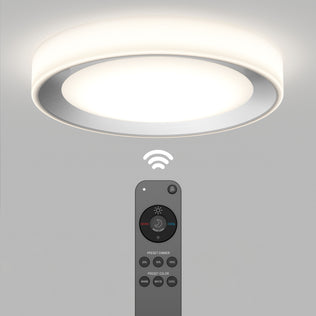 The Artika Cooper LED flush mount light features a soft glow and a remote with multiple buttons, including a nightlight function.