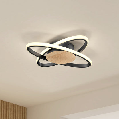 The Artika Atomic 15 in. LED flush mount light features two intersecting black rings with a wooden center and adjustable color temperature (5 CCT), offering a modern look and soft, integrated LED illumination.