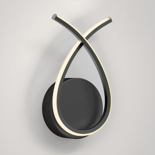 The Artika Gamma modern LED wall sconce 5 CCT features a black circular base and two curved LED light strips forming a looping “X” shape, shown mounted on a plain white wall.