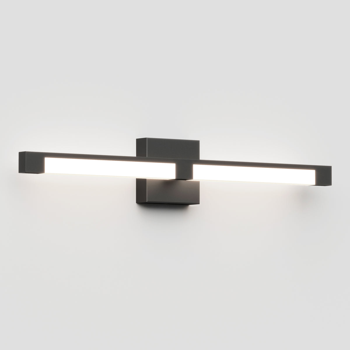 The Artika Tivoli modern LED bathroom vanity light 5 CCT features a sleek black rectangular base and horizontal bar, offering adjustable bright white illumination, elegantly mounted on a plain white wall.