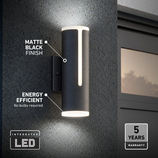 Matte black Linea modern indoor-outdoor LED wall light glowing at the top and bottom, featuring energy-efficient technology and a 5-year warranty.
