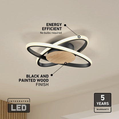 The Artika Atomic 15 in. LED flush mount light 5 CCT features integrated LED rings, a black and painted wood finish, is energy efficient with no bulbs required, and comes with a 5-year warranty.