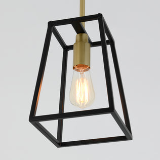 The Artika Carter 1-light pendant features a modern black geometric frame and exposed bulb, ideal for kitchen island lighting.