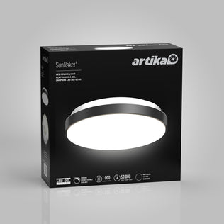 A black box displays the Artika Sunraker 10 in. LED modern flush mount light. The front shows a bright, circular fixture with features: 18W power, 1000 lumens, dimmable, and a 50,000-hour lifespan.