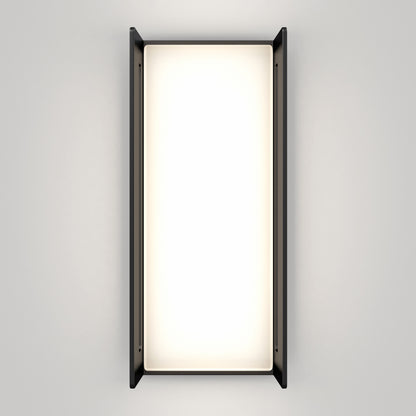 The Artika Ryker smart RGB indoor-outdoor wall light features a bright, glowing center framed by slim black side panels and is mounted on a plain light gray wall.