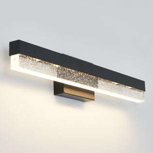 The Artika Bubble Bar 27-in Integrated LED Vanity Light Bar features a modern rectangular black frame with frosted glass, emitting soft white light and mounted on a plain white bathroom wall.