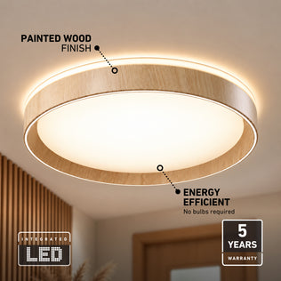 Callisto 15 in. (38 cm) Modern LED Flush Mount Ceiling Light 5 CCT with a round, light wood frame, energy efficiency label, and five-year warranty.