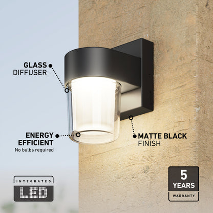 Black Halden indoor-outdoor LED wall light 5 CCT with a glass diffuser, selectable color temperature, energy efficiency, and a five-year warranty.
