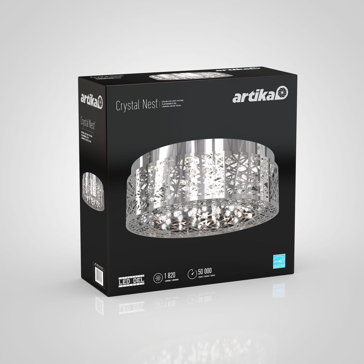 A black Artika box displays the Crystal Nest LED ceiling light fixture with a detailed image of the light’s intricate, nest-like design on the front. Packaging highlights LED, 1820 lumens, and 50,000-hour lifespan.