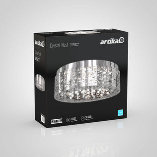 The Artika Crystal Nest LED flush mount comes in black box packaging, displaying its intricate metal and crystal design. Key specs: 1820 lumens brightness and a 50,000-hour lifespan.