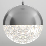 A spherical pendant light with a metallic top half and a faceted, crystal-like bottom half that glows brightly. The fixture hangs from a central rod against a plain, light background.