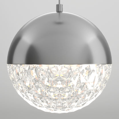 The Artika Carat LED pendant light 3 CCT features a metallic dome top and a faceted, crystal-like lower half, emitting a bright, diffused glow against a plain light gray background.