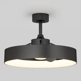 Modern black ceiling light fixture with a wide, circular shade and a diffused, glowing light, mounted on a short black rod against a plain light gray background.