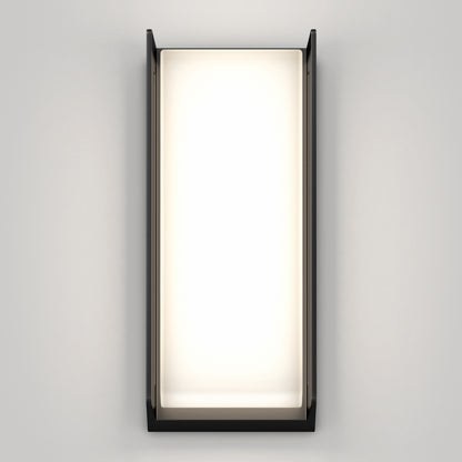 The Artika Ryker smart RGB indoor-outdoor wall light features a black frame and softly glowing white center, mounted on a plain light gray wall.