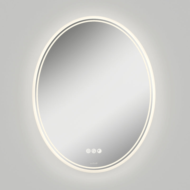 The Artika Corby 22 in. x 28 in. LED mirror features a glowing LED ring, three touch buttons for controls, and an integrated defogger, all mounted on a plain gray wall.