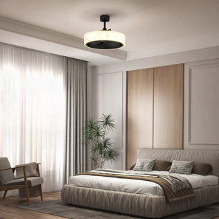 Modern bedroom with a large bed, neutral decor, potted plant, armchair, and the Artika Selena 23 in. LED ceiling fan with remote.