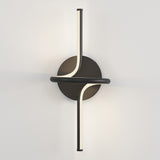 A modern black wall sconce with two curved, illuminated light bars crossing over a circular base, mounted on a white wall.