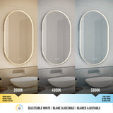 An oval LED bathroom mirror is shown in three lighting modes: warm white (3000K), neutral (4000K), and cool white (5000K). Each mode illuminates the same modern white sink and tile wall backdrop.