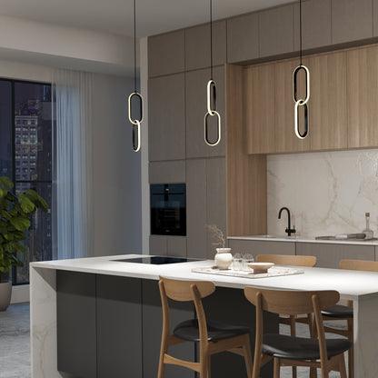 A modern kitchen with a marble island, wooden chairs, dark cabinets, and Artikas Catena LED pendant light 5 CCT. Built-in appliances, a sink, city views through large windows, and a potted plant in the corner complete the look.