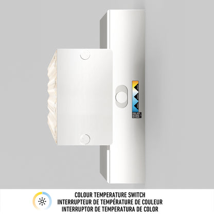 Overhead view of the Adeline modern LED bathroom vanity light 3 CCT by Artika, featuring a button and label with color temperature options. “COLOUR TEMPERATURE SWITCH” is displayed below in English, French, and Spanish.