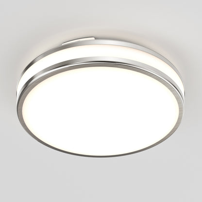 The Artika Hemisphere 15 in. LED flush mount light features a modern circular design with a metal rim and frosted white diffuser, offering adjustable brightness and 5 CCT options—perfect for bright, even bathroom lighting on any white ceiling.