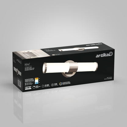 Black rectangular product box for the Artika Adina modern bathroom vanity light 3 CCT, showing the fixture image on the front and details like wattage, warranty, and certifications on the sides.