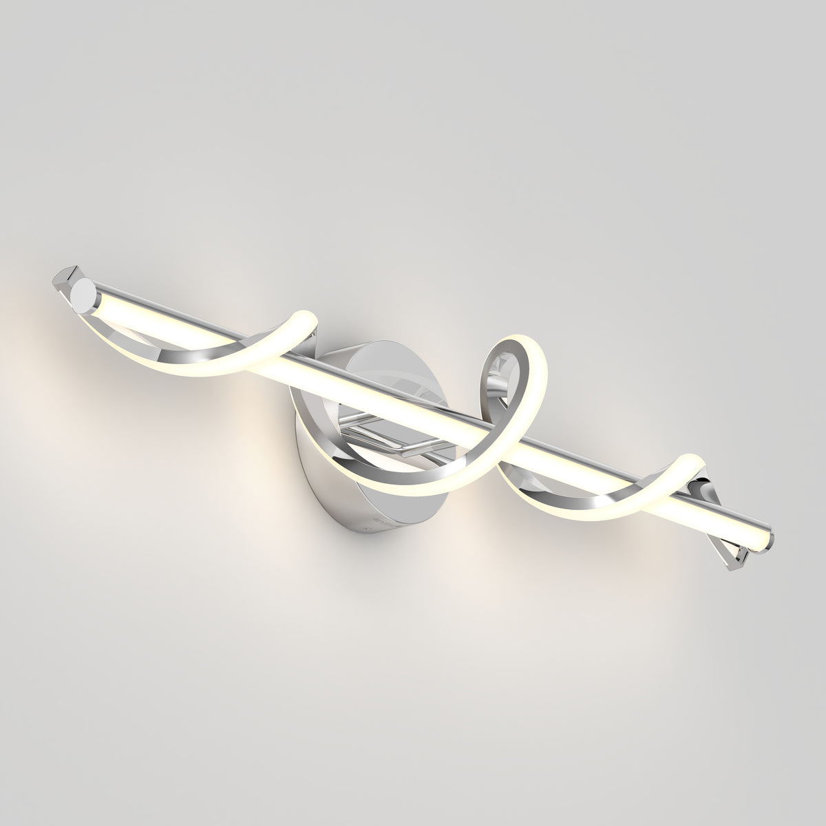 A modern wall-mounted LED light with a sleek chrome base and a curved, spiral-shaped illuminated tube wrapping around a straight metallic rod. The light is turned on, casting a soft glow on the wall.
