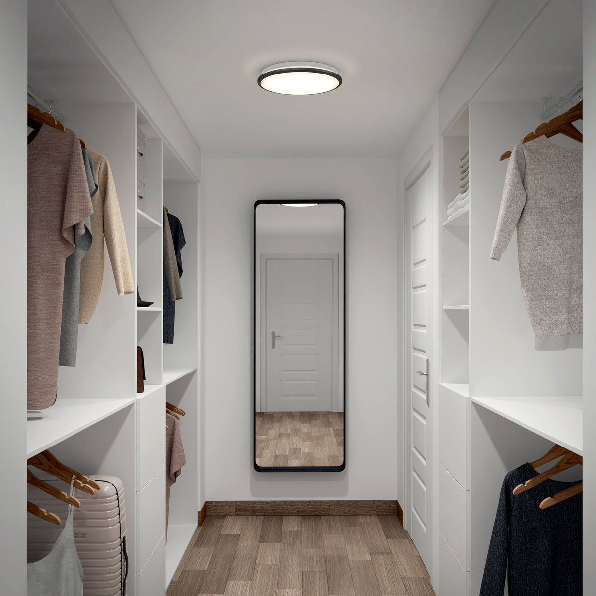 A modern walk-in closet with white shelves, hanging clothes, folded items, and a large rectangular mirror on the wall at the end. The space features wooden flooring and a ceiling light.