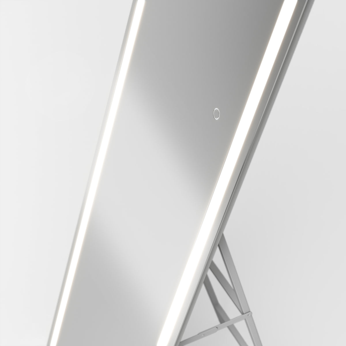 The Artika Emeraude 19"x59" full-length LED mirror stands on a minimal frame, ideal as a wall or floor accent.