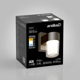 A black Artika Halden LED wall light box with product image, specifications, and features printed on the packaging, displayed against a light gray background.