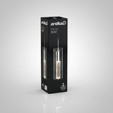 A black rectangular box displays the Artika Bubble Flow pendant light, featuring a cylindrical glass fixture with bubble detailing. The packaging shows product images and brand logos on a gradient light background.