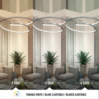 A modern living room showcases the Artika Salto LED pendant light in chrome, displayed above a gray sofa and green plant, with three color temperatures: 2700K (warm), 3500K (neutral), and 4500K (cool).