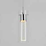 A modern pendant light with a cylindrical clear glass shade and a chrome fixture, featuring an illuminated inner tube with small bubbles, suspended against a plain light gray background.