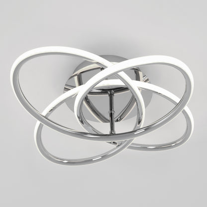 The Artika Swirl Butterfly LED contemporary flush mount light features intertwined chrome and white LED loops in a sculptural, geometric design, shown against a plain light gray background.