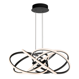 The Artika Maelstrom LED pendant light features intertwined black and white rings suspended by two cables from a round black mount, offering a sculptural, contemporary design.