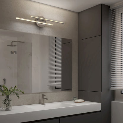 Modern bathroom with a large mirror, sleek white sink, minimalist faucet, potted plant, cabinet storage, and horizontal blinds. Above the mirror hangs the Artika Cisco modern LED bathroom vanity light 5 CCT.