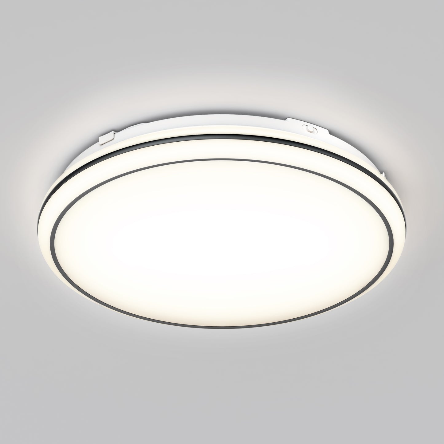 The Artika Emina 13 in. LED flush mount light features a white frosted cover, delivers 800 lumens, and is installed flush against a gray ceiling.
