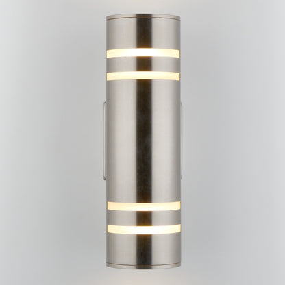 The Voltz indoor/outdoor wall light by Artika-CAN-dev is a modern cylindrical sconce with a brushed metal finish and frosted bands, mounted vertically on a white background to highlight its sleek, rust-resistant design.