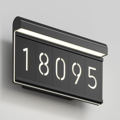 The Artika Bowen modern LED outdoor address wall light 5 CCT displays the number 18095 in black against a light gray wall, featuring white LED backlighting for a sleek, contemporary look.