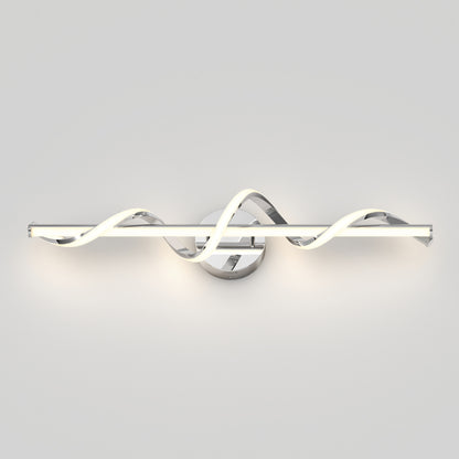 The Artika Coda modern LED bathroom vanity light features a wavy, twisted design and chrome base, emitting a soft white glow against a light gray wall.