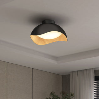 The Artika Adara 15 in. LED flush mount light features a curved black and wood finish for contemporary ceilings.