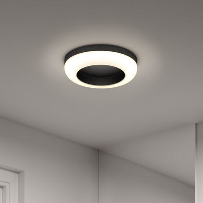 The Artika-CAN-dev Louka 15 in. modern LED flush mount light 5 CCT features a glowing white ring, adding elegant style to any minimalist room. Adjustable white hues let you create the perfect ambiance for every setting.
