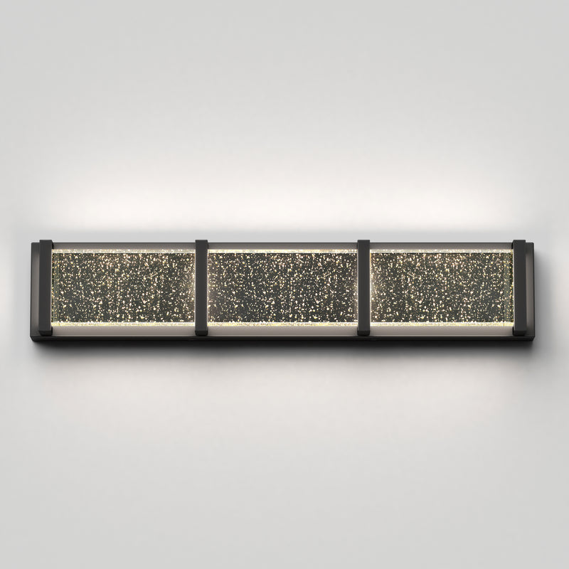 The Artika Subway Essence 27-in Integrated LED Vanity Light Bar features three bubble-glass panels in dark metal and tunable white LEDs, providing soft white illumination—perfect for modern bathroom lighting.